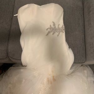 Size 12. Wedding dress. Need deep cleaning.